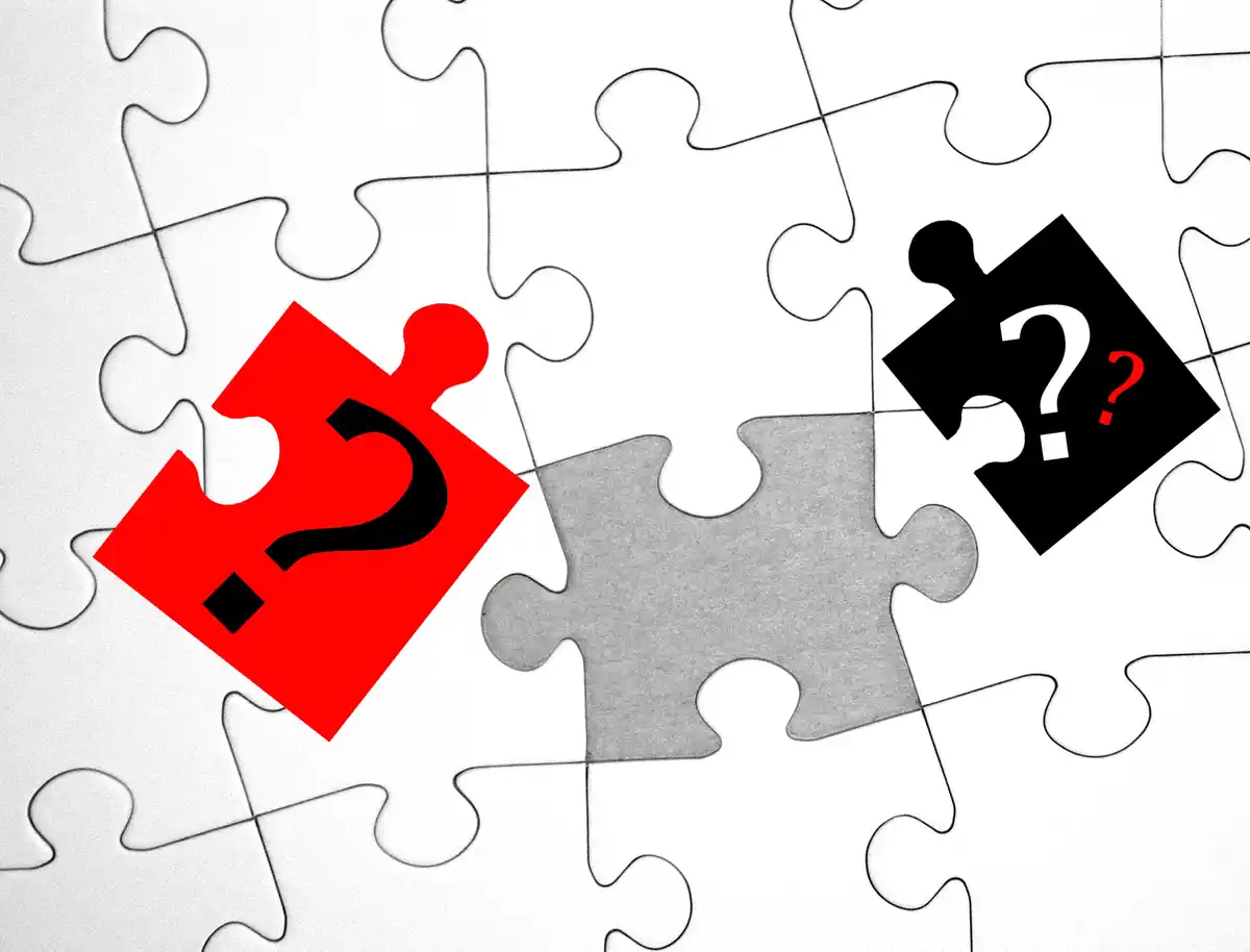 Puzzle mit Fragezeichen
